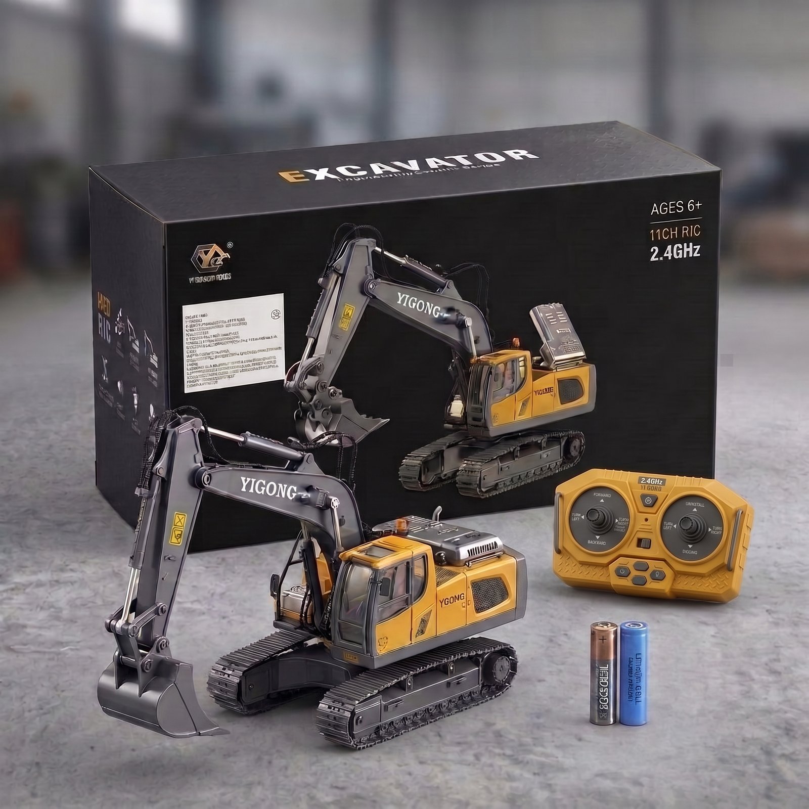 Excavadora, mando, baterías y caja